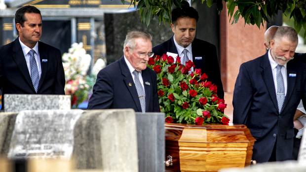 Senator Barney Cooney is laid to rest at Cheltenham Memorial Park on Friday. 