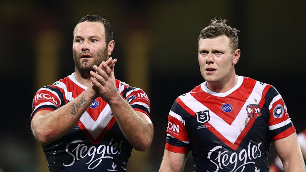 Boyd Cordner (left) was cheered by the Roosters faithful when he returned to the field on Friday night.
