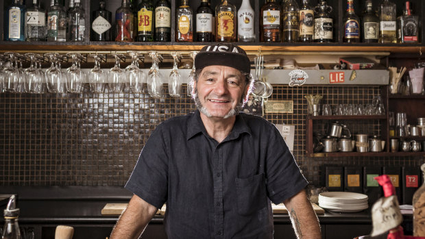 Russell Tarbett is the owner of Hells Kitchen. Over the past two decades, bars such as Hells Kitchen have noticed consumers changing their drinking game because of card use. 