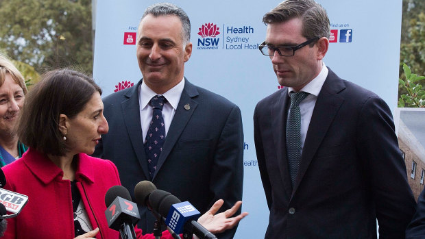 The Member for Drummoyne, John Sidoti (centre) wants strata committees to have to opt in to allow Airbnb in buildings