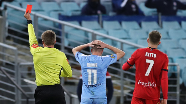 Craig Noone is red carded off during Melbourne City's 2-2 draw with Adelaide United  on Tuesday night.