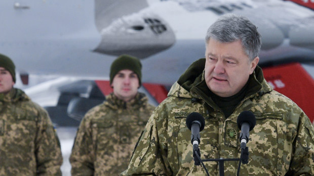 Ukrainian President Petro Poroshenko addresses the Armed Forces of Ukraine at the military airfield in the Vasylkiv region, Ukraine, earlier in December.
