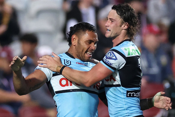 Jesse Ramien and Nicho Hynes celebrate Ramien’s try against Manly.