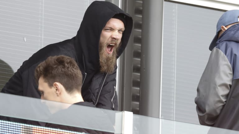 Max Yawn: Melbourne ruckman watches on from the stands.