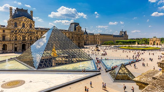 The glass pyramid was designed to handle 4 million entries a year. But the Louvre now regularly draws more than twice that figure.
