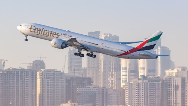 A man has died onboard an Emirates flight overnight.