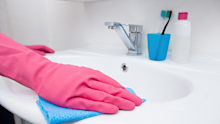 Many people wear gloves when they clean the bathroom to avoid germs, but there are other reasons they can be useful.