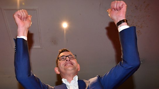 The Premier celebrates after his re-election in 2018.