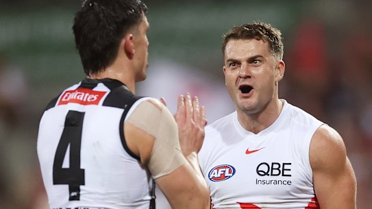 Tom Papley of the Swans celebrates kicking a goal.