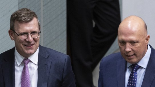 Alan Tudge and Opposition Leader Peter Dutton arrive for question time today.