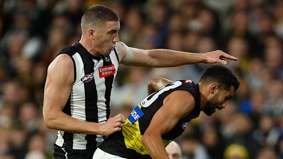 Darcy Cameron, left, and Marlion Pickett contest the ball during round three. 