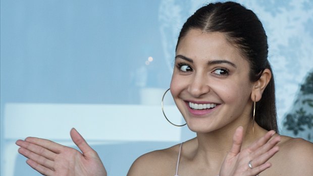 Bolly good: Virat Kohli's wife, Anushka Sharma, takes in the action at the SCG on Thursday.