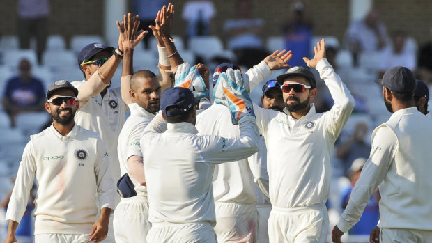 Chasing history: Indian players celebrate en route to their emphatic win in the third Test.