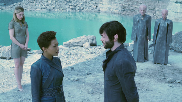 Michael (Sonequa Martin-Green) and Spock (Ethan Peck) are reunited, as Vina (Melissa George) looks on.