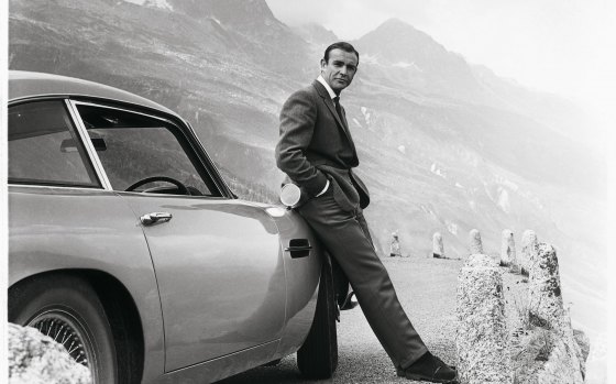 Bond with his Aston Martin 