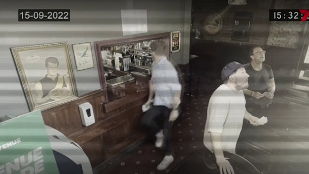 A screenshot from The Front Bar skit. The character is running in the same disciplined fashion that umpires do on television.