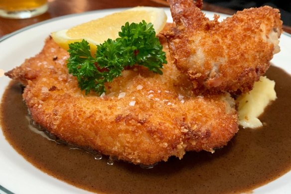 The Unicorn’ famous chicken schnitzel with mashed potato and gravy.