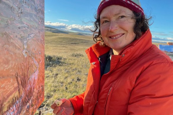 Lucy Culliton at work on her creek series.