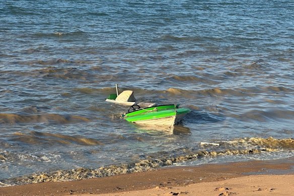 The green boat washed ashore on Magnetic Island on Saturday with no one on board.