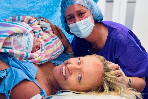 Baby Angus, his intended mother Edwina Peach , and his surrogate mother Jennifer McCloy moments after his birth in November 2022. The women are campaigning for change to make surrogacy more accessible in Australia.