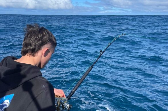 Gazzola working to reel in the mammoth 135kg southern blue fin tuna. 