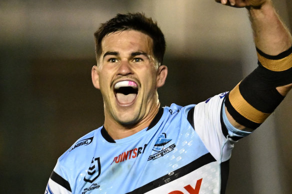 Daniel Atkinson celebrates his golden-point field goal against Newcastle.