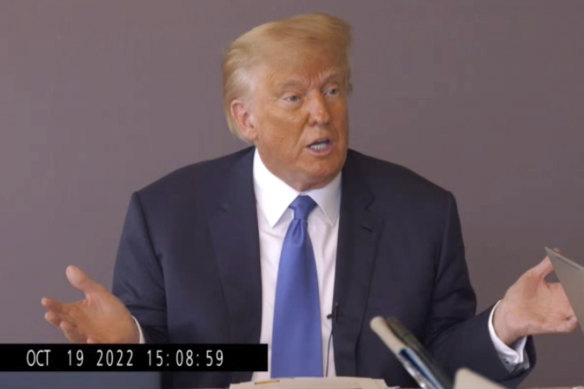 In this image taken from video, former president Donald Trump answers questions during his deposition on October 19, 2022.