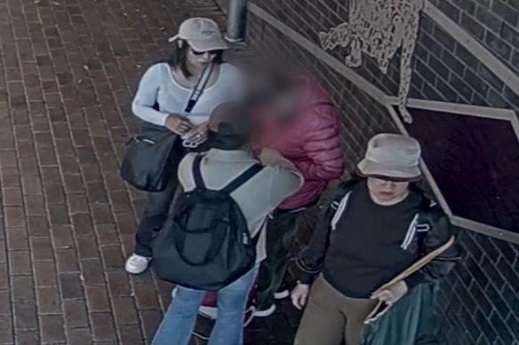 CCTV footage from Blacktown shows  a 73-year-old woman being approached three unknown women. 