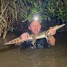 Australian Reptile Park manager Billy Collett with a freshwater crocodile captured at Wallsend on Sunday, March 1, 2026.