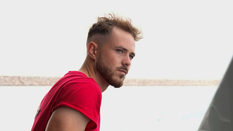 Reality TV star accused of domestic violence flees Australia as arrest warrant issued