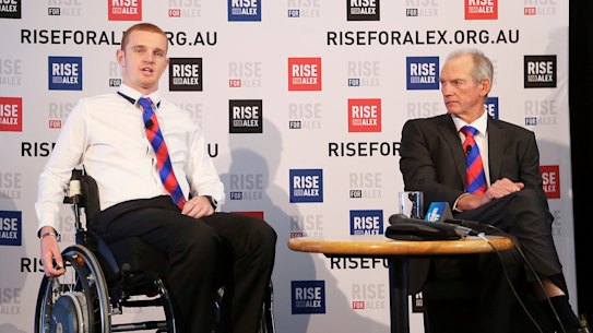 Alex McKinnon and Wayne Bennett
at a press conference for the Rise for
Alex Round in 2014.