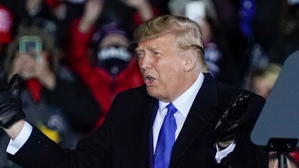  Donald Trump at a campaign rally in Wisconsin on Saturday night (Sunday AEDT).