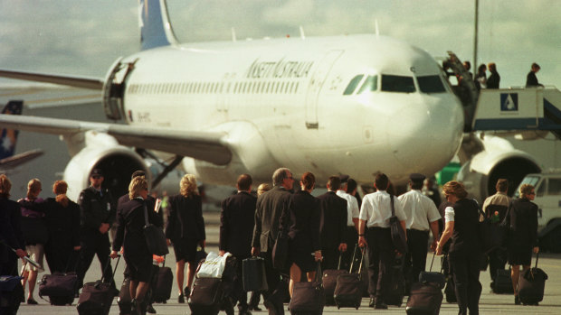 Ansett staff leaving on a flight out of Adelaide on its way to Melbourne