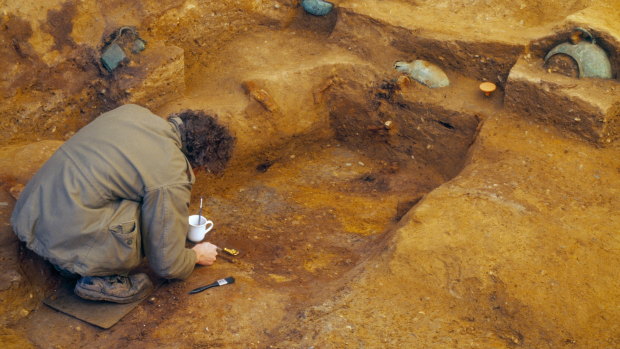An archeologist works in an Anglo-Saxon Christian burial chamber at Prittlewell in Southend-on-Sea, England.