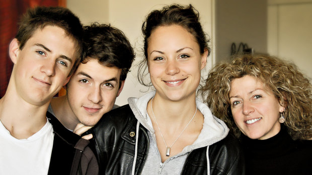 Phoebe with her brothers and mother.