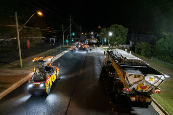 The scene earlier this year as construction of coffee-cup-infused asphalt was laid down in Penrith.