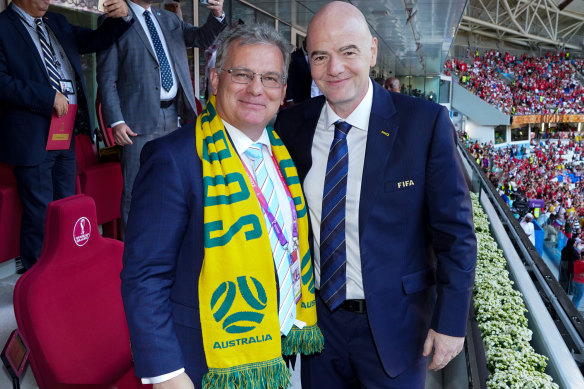 Football Australia chairman Chris Nikou with FIFA president Gianni Infantino at the 2022 World Cup in Qatar.