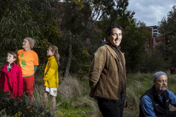 Members of the Upfield Urban Forest group: Anna Sinn, Greta and Esme Holroyd, Tamar Hopkins and Gerard Morel. They are photographed in the Urban Forest near Brunswick station. 