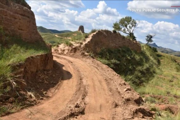 Two people have been arrested for allegedly tearing a giant hole through the Great Wall of China with an excavator to create a shortcut.