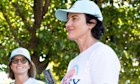 Curtin independent MP Kate Chaney (right) on a pre-poll booth. 