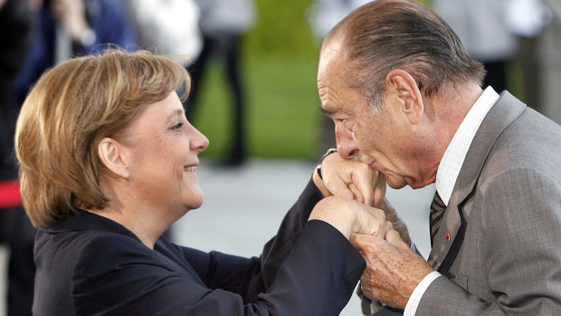 Former French president Jacques Chirac greets German Chancellor Angela Merkel in 2007.