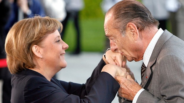 Former French president Jacques Chirac greets German Chancellor Angela Merkel in 2007.