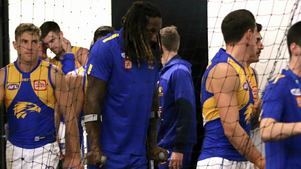 Naitanui on crutches in the West Coast rooms after his second ACL injury last season.