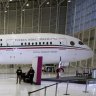 FILE - In this July 27, 2020 file photo, Mexican President Andres Manuel Lopez Obrador, center left, waves to the press as he arrives to give his daily, morning press conference in front of the former presidential plane at Benito Juarez International Airport in Mexico City. LÃ³pez Obradorâs quixotic bid to sell off the presidential jet has now stretched into its third year in 2021, with no sign of a buyer in sight. (AP Photo/Marco Ugarte, File) APÂ 