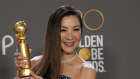 Michelle Yeoh with the award for best performance by an actress in a motion picture, musical or comedy for Everything Everywhere All at Once.
