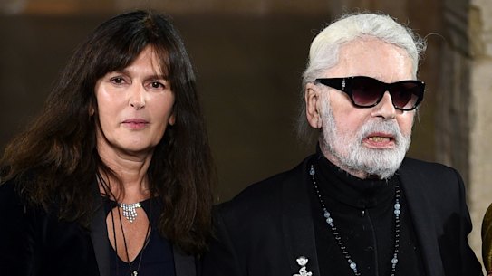 Virginie Viard, left, with Karl Lagerfeld and his godson Hudson Kroenig during the finale of the Chanel Metiers d'Art 2018/19 Show at the Metropolitan Museum of Art on Tuesday, December 4, 2018, in New York. 