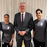 Minister for Home Affairs Tony Burke with five Iranian women soccer players who were granted asylum on Monday night. Some of the players have now left Australia.