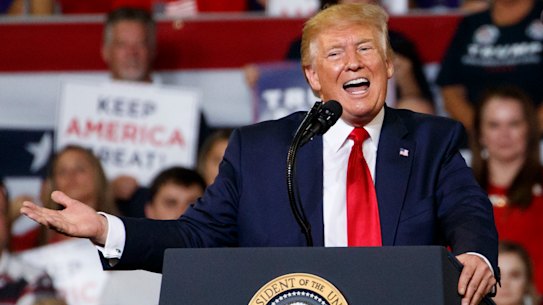 US President Donald Trump speaks at a campaign rally at Williams Arena in Greenville, NC.