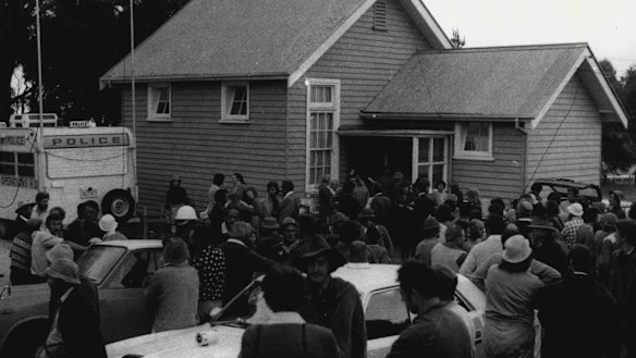 Concerned parents and friends outside the Wooreen Primary School.