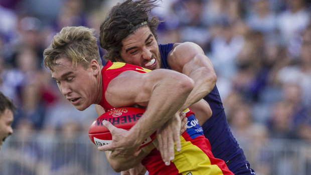 Tom Lynch and Alex Pearce get tangled up.